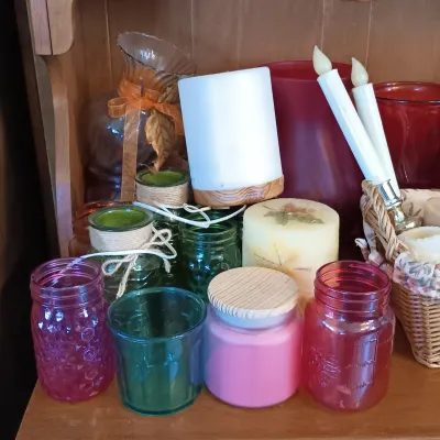 LOT 246: Large Collection of Candles, Vases & More