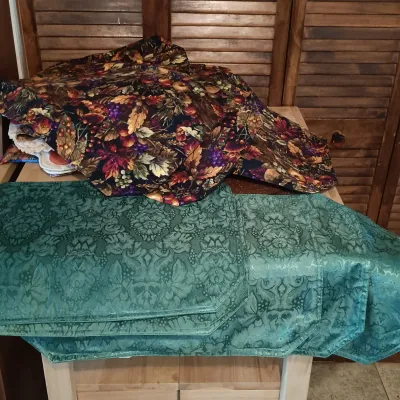 LOT 250: Large Collection of Holiday Linen Placemats and Napkins with NIP Paper Napkins