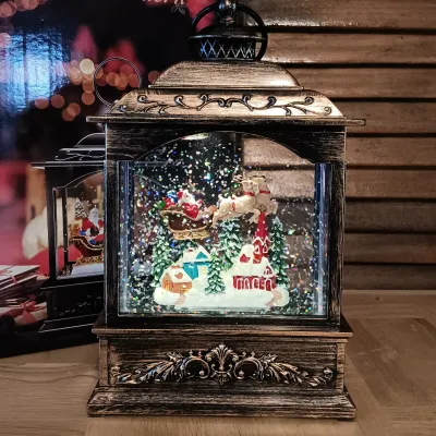 LOT 247: Mr. Christmas Deluxe Bell Symphonium with Records, Western Germany Paper Ornaments, Light-Up Water Lantern & More