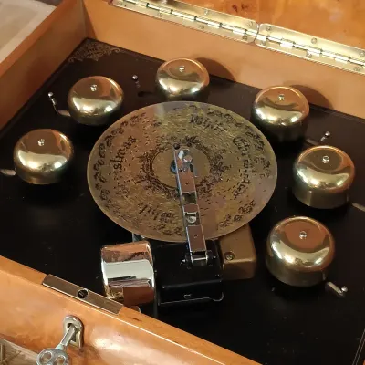 LOT 247: Mr. Christmas Deluxe Bell Symphonium with Records, Western Germany Paper Ornaments, Light-Up Water Lantern & More