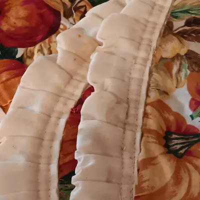 LOT 250: Large Collection of Holiday Linen Placemats and Napkins with NIP Paper Napkins