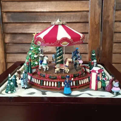 LOT 248: Mr Christmas Holiday Music Box & Gold Label Deluxe Music Box Carousel