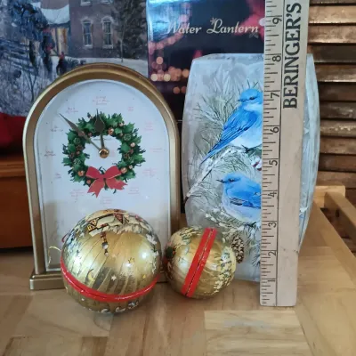 LOT 247: Mr. Christmas Deluxe Bell Symphonium with Records, Western Germany Paper Ornaments, Light-Up Water Lantern & More