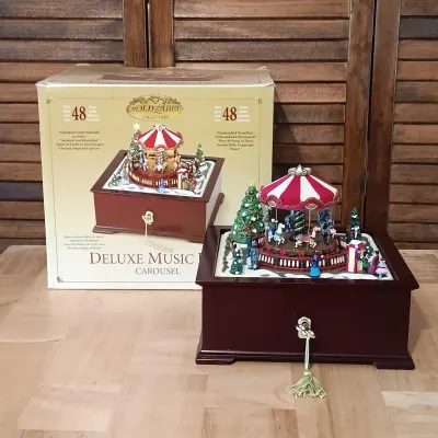LOT 248: Mr Christmas Holiday Music Box & Gold Label Deluxe Music Box Carousel