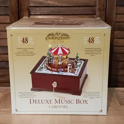 LOT 248: Mr Christmas Holiday Music Box & Gold Label Deluxe Music Box Carousel