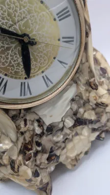 Sale Photo Thumbnail #399: Vintage Hand Crafted Genuine Mother of Pearl Lanshire "Vomit Clock" is a highly collectible Mid-Century Modern (MCM) piece. These kitschy, handmade clocks feature natural materials and colorful resin."Vomit clocks" get their quirky name from the crafting 