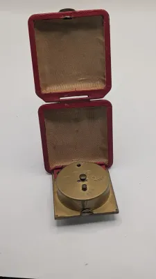 Sale Photo Thumbnail #408: Clocks are untested - The Elgin face cover has come off

Bradley and Elgin are classic mid-20th-century folding travel and desk alarm clocks manufactured in (West) Germany, typically featuring mechanical wind-up, 1-jewel movements. Often utilized by vario