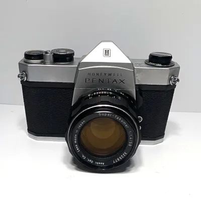 Sale Photo Thumbnail #377: Untested

The Honeywell Pentax SP 1000 is a durable 35mm SLR film camera originally distributed in North America. The camera, which features a mechanical M42 screw mount and built-in light metering