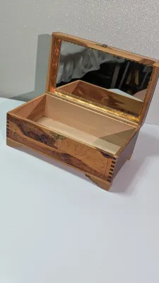 Sale Photo Thumbnail #439: The cedar box with the flower design has a broken latch

Vintage hand-carved cedar jewelry boxes featuring dovetail joints are highly sought-after mid-century collectibles, valued for their aromatic qualities, durability, and distinct folk-art aesthetic. 
