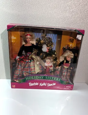 Sale Photo Thumbnail #490: The Barbie Holiday Sisters collection features various iconic multi-doll gift sets released by Mattel in the late 1990s and early 2000s, grouping Barbie, Stacie, and Kelly together in festive Christmas attire
This classic release features the three sister