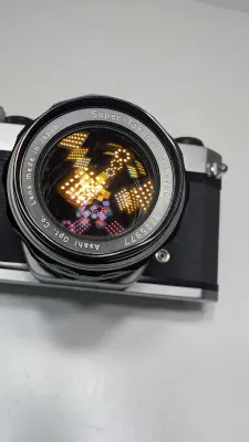 Sale Photo Thumbnail #370: Untested 

The Kodak Instamatic Reflex is a high-end single-lens reflex (SLR) camera manufactured in Germany by Kodak AG between 1968 and 1974. It represents Kodak's most advanced and sophisticated effort to cater to serious photographers using the 126 ca