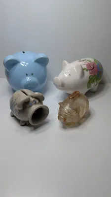 Sale Photo Thumbnail #228: The floral bank is missing the cover on the bottom

Piggy banks are excellent tools for teaching financial responsibility, organizing loose change, or adding a decorative accent to a room. Whether you are looking for a classic keepsake nursery decoration 