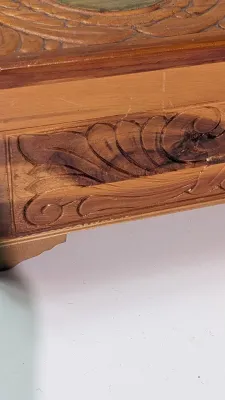 Sale Photo Thumbnail #434: The cedar box with the flower design has a broken latch

Vintage hand-carved cedar jewelry boxes featuring dovetail joints are highly sought-after mid-century collectibles, valued for their aromatic qualities, durability, and distinct folk-art aesthetic. 