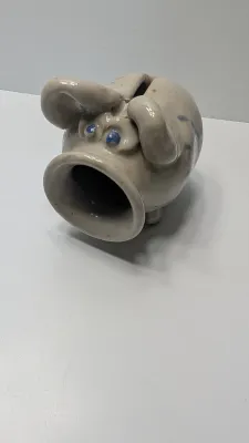 Sale Photo Thumbnail #236: The floral bank is missing the cover on the bottom

Piggy banks are excellent tools for teaching financial responsibility, organizing loose change, or adding a decorative accent to a room. Whether you are looking for a classic keepsake nursery decoration 