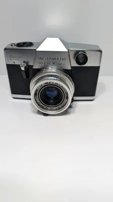 Sale Photo Thumbnail #369: Untested 

The Kodak Instamatic Reflex is a high-end single-lens reflex (SLR) camera manufactured in Germany by Kodak AG between 1968 and 1974. It represents Kodak's most advanced and sophisticated effort to cater to serious photographers using the 126 ca