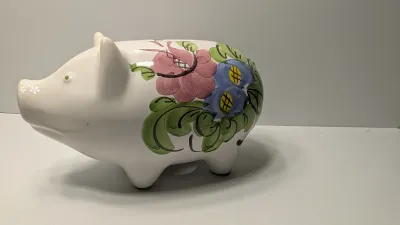 Sale Photo Thumbnail #245: The floral bank is missing the cover on the bottom

Piggy banks are excellent tools for teaching financial responsibility, organizing loose change, or adding a decorative accent to a room. Whether you are looking for a classic keepsake nursery decoration 