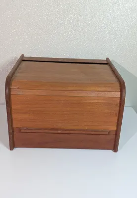 Sale Photo Thumbnail #411: Vintage Mid-Century Modern (MCM) Danish Modern Teak Tambour Roll-Top Box Organizers are highly sought-after collectible pieces designed for both stylish desktop organization and vintage media storage. These functional pieces feature rich solid teak wood g