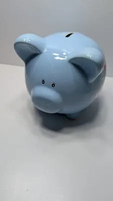 Sale Photo Thumbnail #230: The floral bank is missing the cover on the bottom

Piggy banks are excellent tools for teaching financial responsibility, organizing loose change, or adding a decorative accent to a room. Whether you are looking for a classic keepsake nursery decoration 