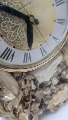 Sale Photo Thumbnail #400: Vintage Hand Crafted Genuine Mother of Pearl Lanshire "Vomit Clock" is a highly collectible Mid-Century Modern (MCM) piece. These kitschy, handmade clocks feature natural materials and colorful resin."Vomit clocks" get their quirky name from the crafting 