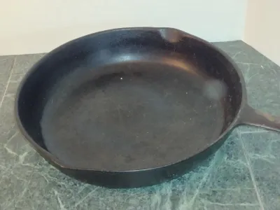 Pair of Cast Iron Skillets- One Lodge and One Unmarked