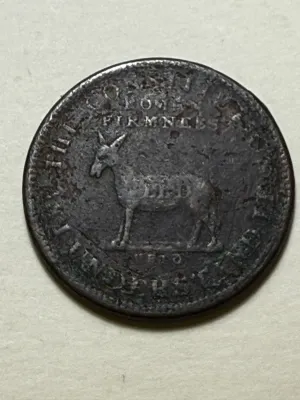 HARD TIMES TOKEN LOW GRADE PITTED & POROUS AS PICTURED.