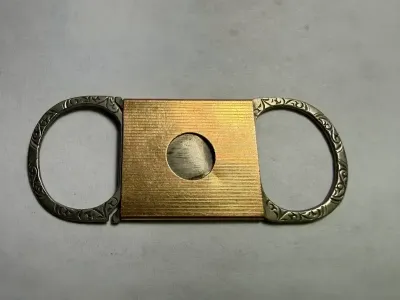 ENGRAVED ART DECO ERA STERLING & 14K SOLID GOLD CIGAR CUTTER PREOWNED FROM AN ESTATE USED AS PICTURED.