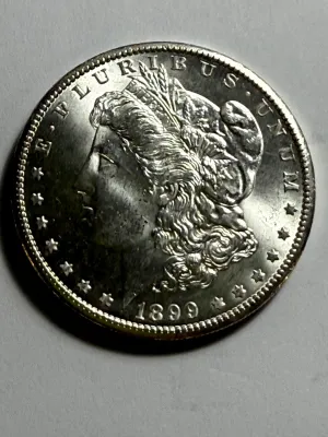 1899-O MS64+ UNCIRCULATED CONDITION MORGAN SILVER DOLLAR COIN-92T AS PICTURED.