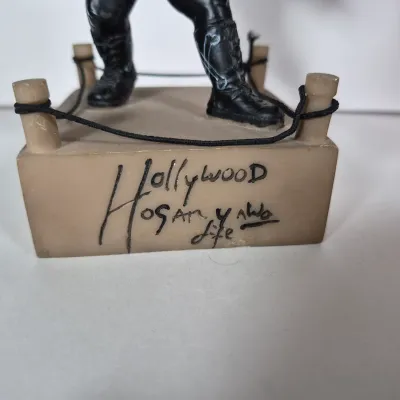 LOT 194Z: WWF Hollywood Hulk Hogan & Stone Cold Steve Austin Collection with Autographed T-shirt by HHH & Steve Austin