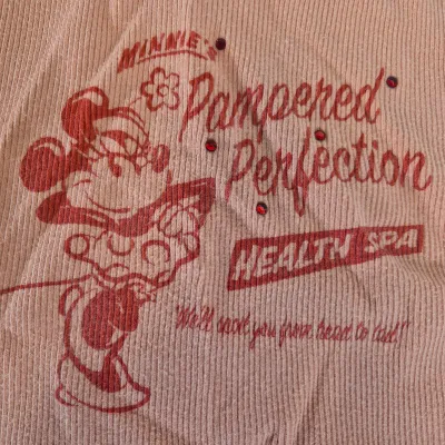 LOT 24B: Assortment of Disney Ladies Clothing-Some New with Tags with Universal Studios & Hard Rock Cafe