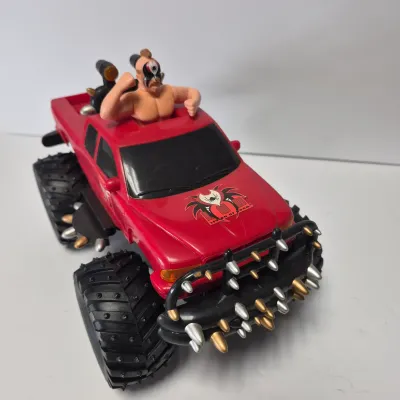 LOT 47B: Vintage WWF Titan Tron Entrance Stage & Talking/Action Monster Trucks with Undertaker, Stone Cold & Legion of Doom