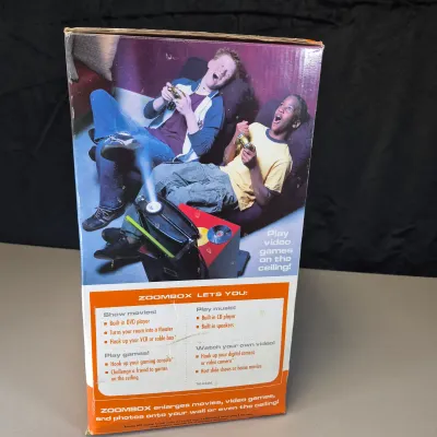 LOT 56B: Tiger Electronics Zoombox Portable Projector DVD/CD Player with Apollo Portable Projection Screen with Tripod Metal Base