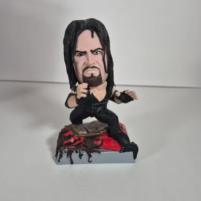 LOT 195Z: WWF Collection with Kane, Undertaker, Sting & More