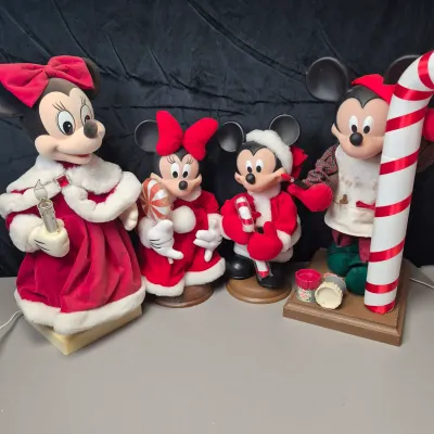 LOT 44B: Two Sets of Mickey & Minnie Holiday Animated Standees