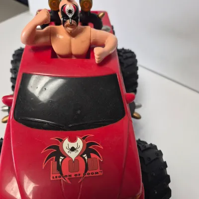 LOT 47B: Vintage WWF Titan Tron Entrance Stage & Talking/Action Monster Trucks with Undertaker, Stone Cold & Legion of Doom