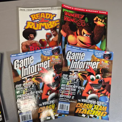 LOT 34B: Collection of Gaming Magazines-Pokémon, Prima's Official Strategy Guide, Game Informer & More