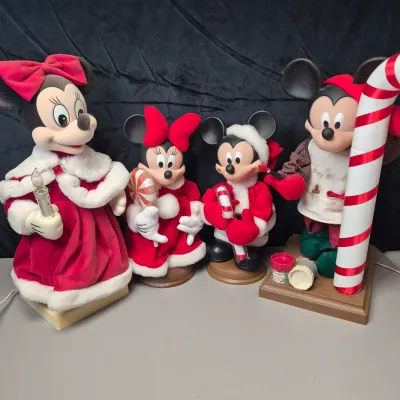 LOT 44B: Two Sets of Mickey & Minnie Holiday Animated Standees