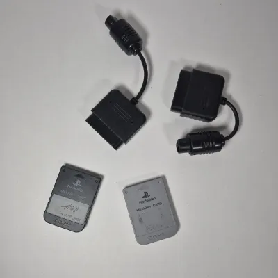 LOT 199Z: Sony Play Station Console, 4 Controllers, Memory Cards in Rolling Storage Cart