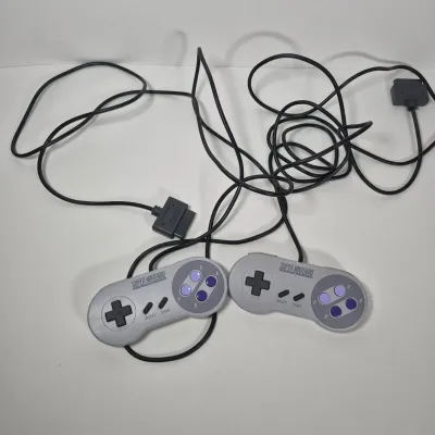 LOT 198Z: Super Nintendo Console & Controllers in Rolling Storage Cart