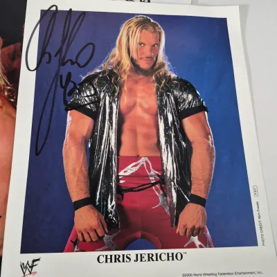 LOT 191Z: Vintage WWF Collection-Chris Jericho Autographs, Raw Magazines, Big Show Action Figure & More