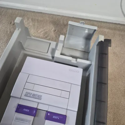 LOT 198Z: Super Nintendo Console & Controllers in Rolling Storage Cart