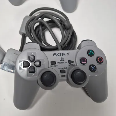 LOT 199Z: Sony Play Station Console, 4 Controllers, Memory Cards in Rolling Storage Cart
