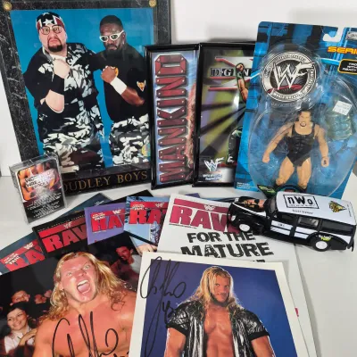 LOT 191Z: Vintage WWF Collection-Chris Jericho Autographs, Raw Magazines, Big Show Action Figure & More