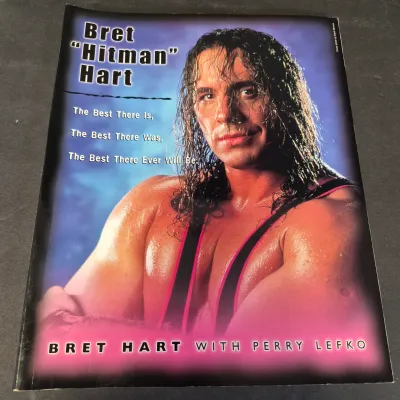 LOT 32B: WWF CD Collection with Mick Foley's Christmas Chaos Book & Bret Hitman Hart Book