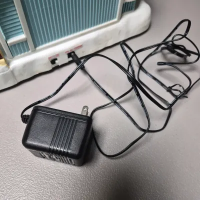 LOT 55B: Musical Ceramic Ferris Wheel & Holiday Lighted Fiber Optic Plastic House in Original boxes from Avon