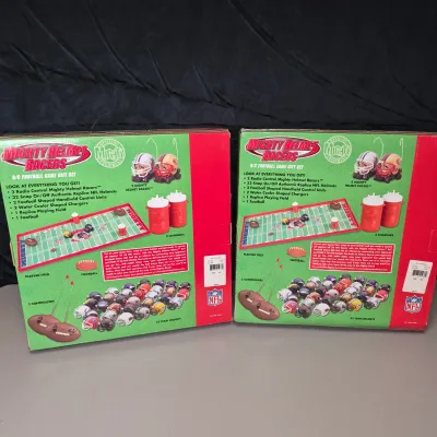 LOT 45B: (2) New in Package NFL Mighty Helmet Racers