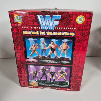 LOT 194Z: WWF Hollywood Hulk Hogan & Stone Cold Steve Austin Collection with Autographed T-shirt by HHH & Steve Austin