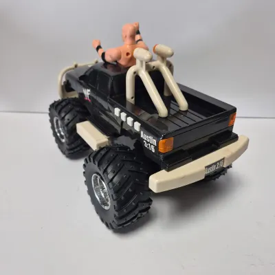 LOT 47B: Vintage WWF Titan Tron Entrance Stage & Talking/Action Monster Trucks with Undertaker, Stone Cold & Legion of Doom