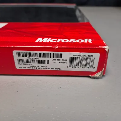 LOT 58B: Never Used-Optimus Pro50MX Headphones, Microsoft Cooling Base, Logitech Cordless Mouse, Large Print Keyboard