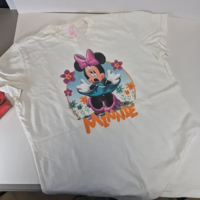 LOT 24B: Assortment of Disney Ladies Clothing-Some New with Tags with Universal Studios & Hard Rock Cafe