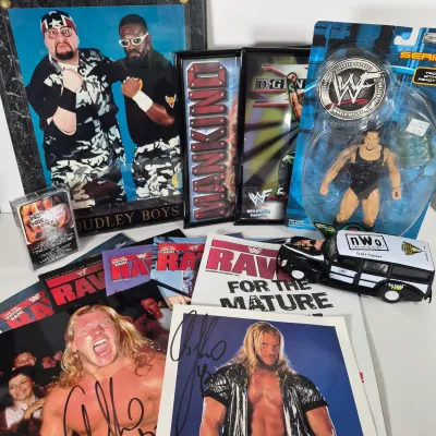 LOT 191Z: Vintage WWF Collection-Chris Jericho Autographs, Raw Magazines, Big Show Action Figure & More